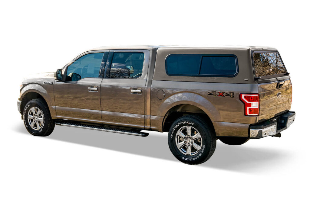 Brown Ford F150 with paint matched truck top