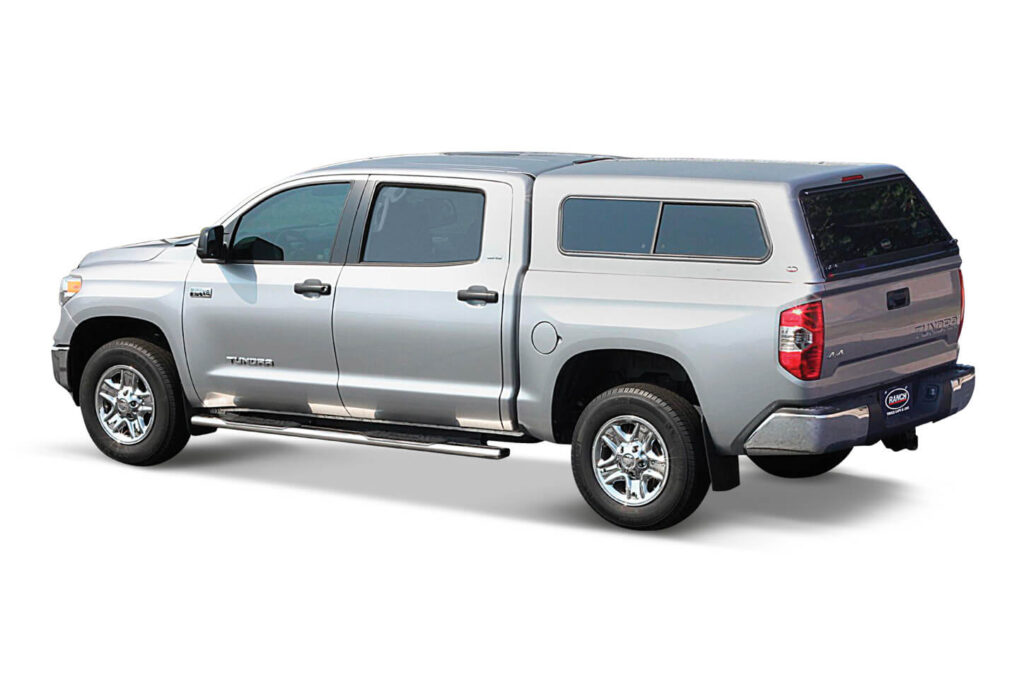 Silver Toyota Tundra with a custom fit truck cap